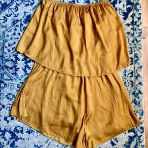 Strapless flowy layered romper.